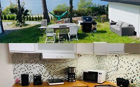 Nice Apartment With1 Bedroom Separate Living Room With A Sofa Bed And A Tiny Kitchen A Bathroom Located In Nordstrand Near By The Sea For 3 Guests With A Garden And Grill 5 Extra Guests With Extra Cost In The Cabin With Sea View Just Outside The Apar